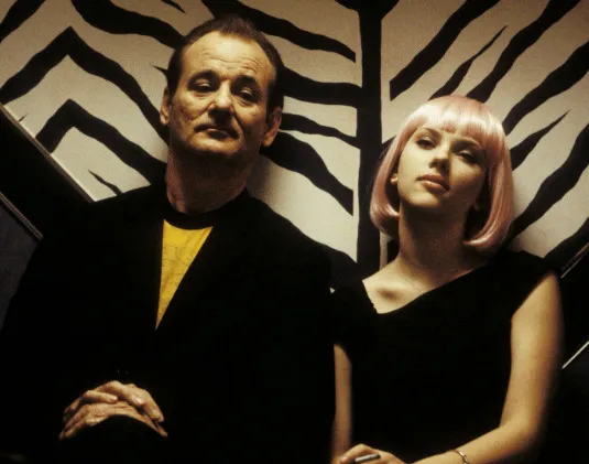 Bill Murray and Scarlett Johansson in Lost in Translation, standing against a zebra-print wall. Pick a film to watch tonight.