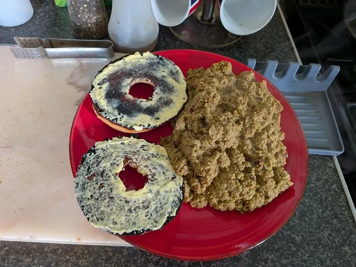 Burnt buttered bagels served alongside a large pile of brown grain as questionable food combos.