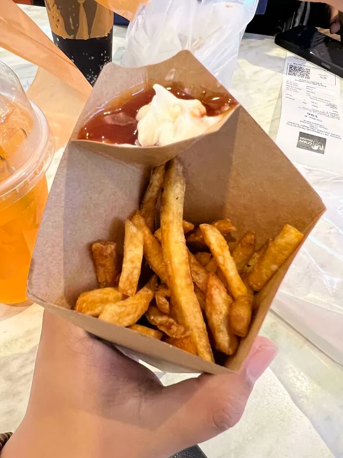 Fries I Had For Lunch Has A Mini Sauce Bowl On Top Of The Packet