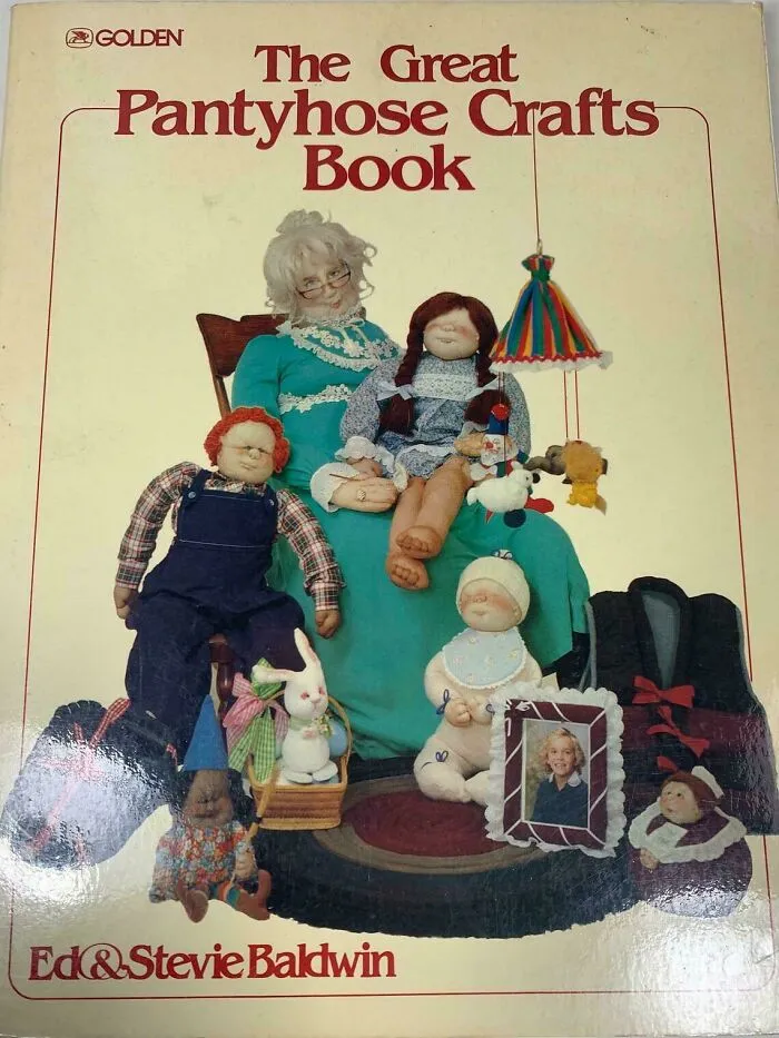 Hilariously unhinged book cover of The Great Pantyhose Crafts Book featuring creepy handcrafted dolls