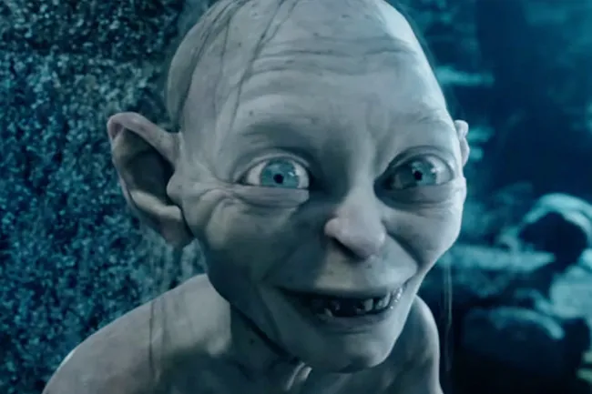 Gollum with wide blue eyes and a sinister smile, a prominent villain from The Lord of the Rings.