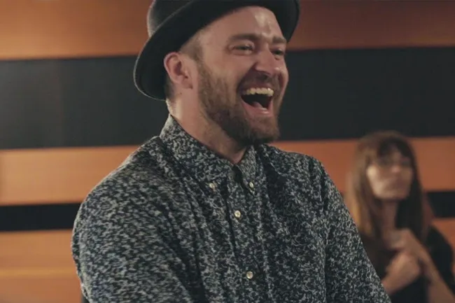 Justin Timberlake laughing and wearing a fedora. His song Can't Stop the Feeling is a great procrastination theme song.