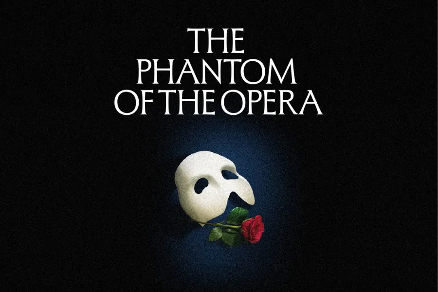 The iconic logo for The Phantom of the Opera, featuring the white mask and a red rose on a dark background.