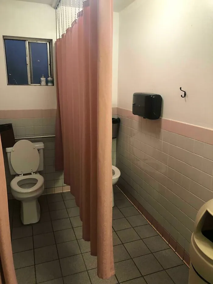 I Can Only Imagine What Splashes Onto Those Curtains (Restaurant Restroom)