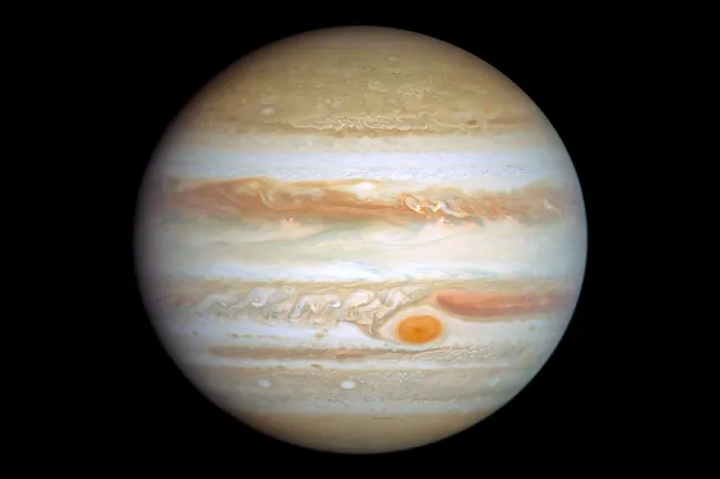 Stunning full view of the planet Jupiter, showcasing its iconic Great Red Spot and swirling cloud bands. Choose a planet.