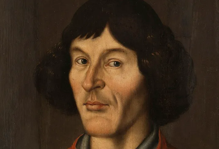 An oil painting portrait of Nicolas Copernicus, a scientist famous for laws of planetary motion. He has dark hair and a serious expression.