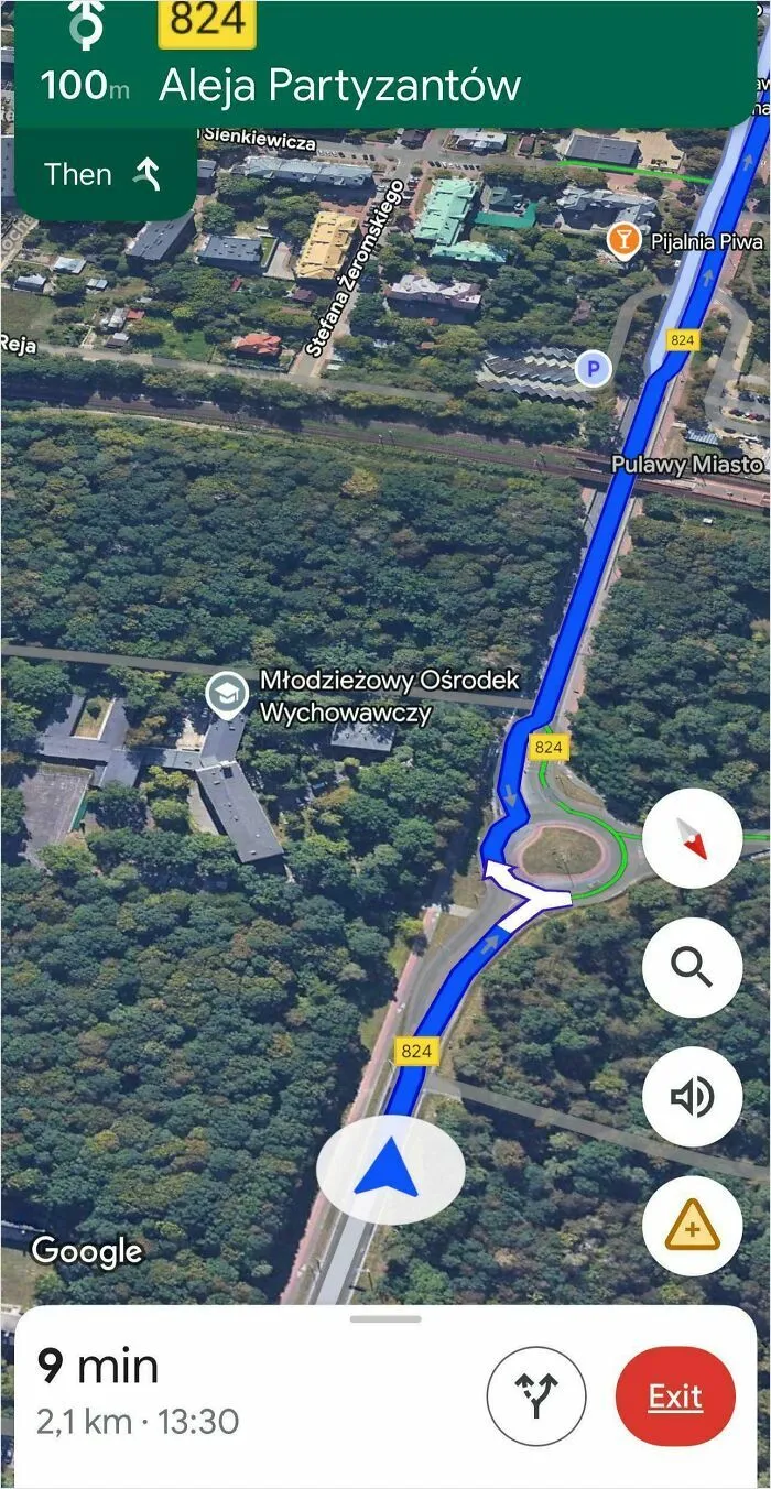 Google Maps navigation showing Aleja Partyzantow route and surrounding forest area