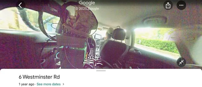 Inside a car with camera gear capturing Google Maps street view images