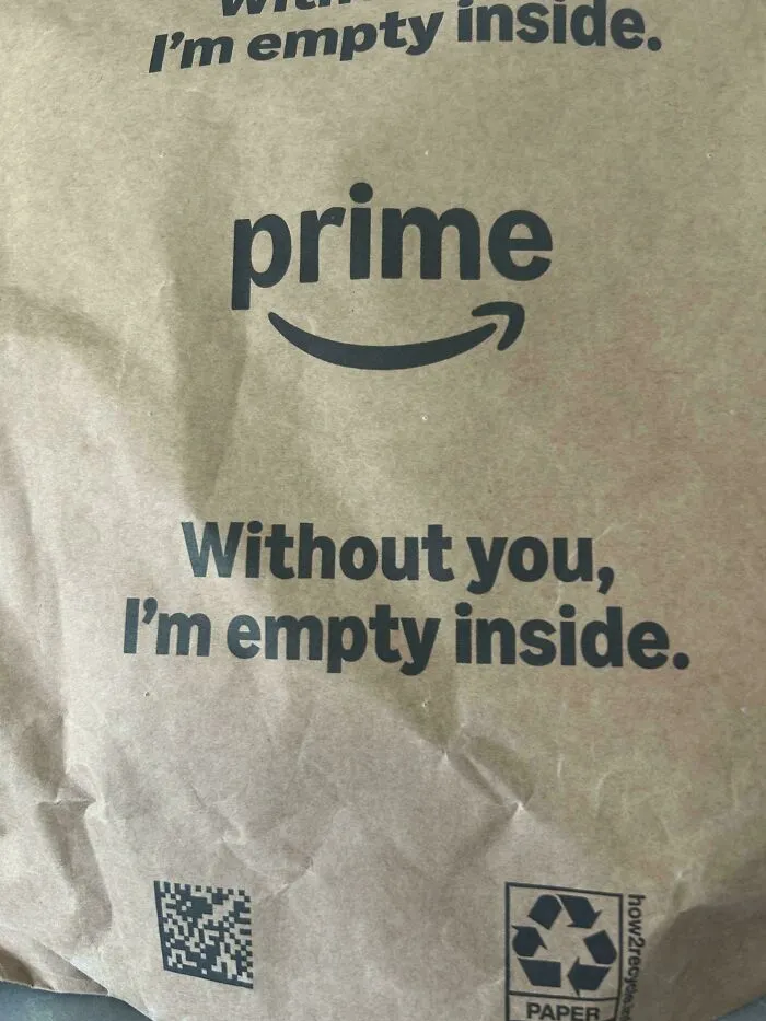 An Amazon Prime bag with the text Without you, Im empty inside, reflecting on consumerism.