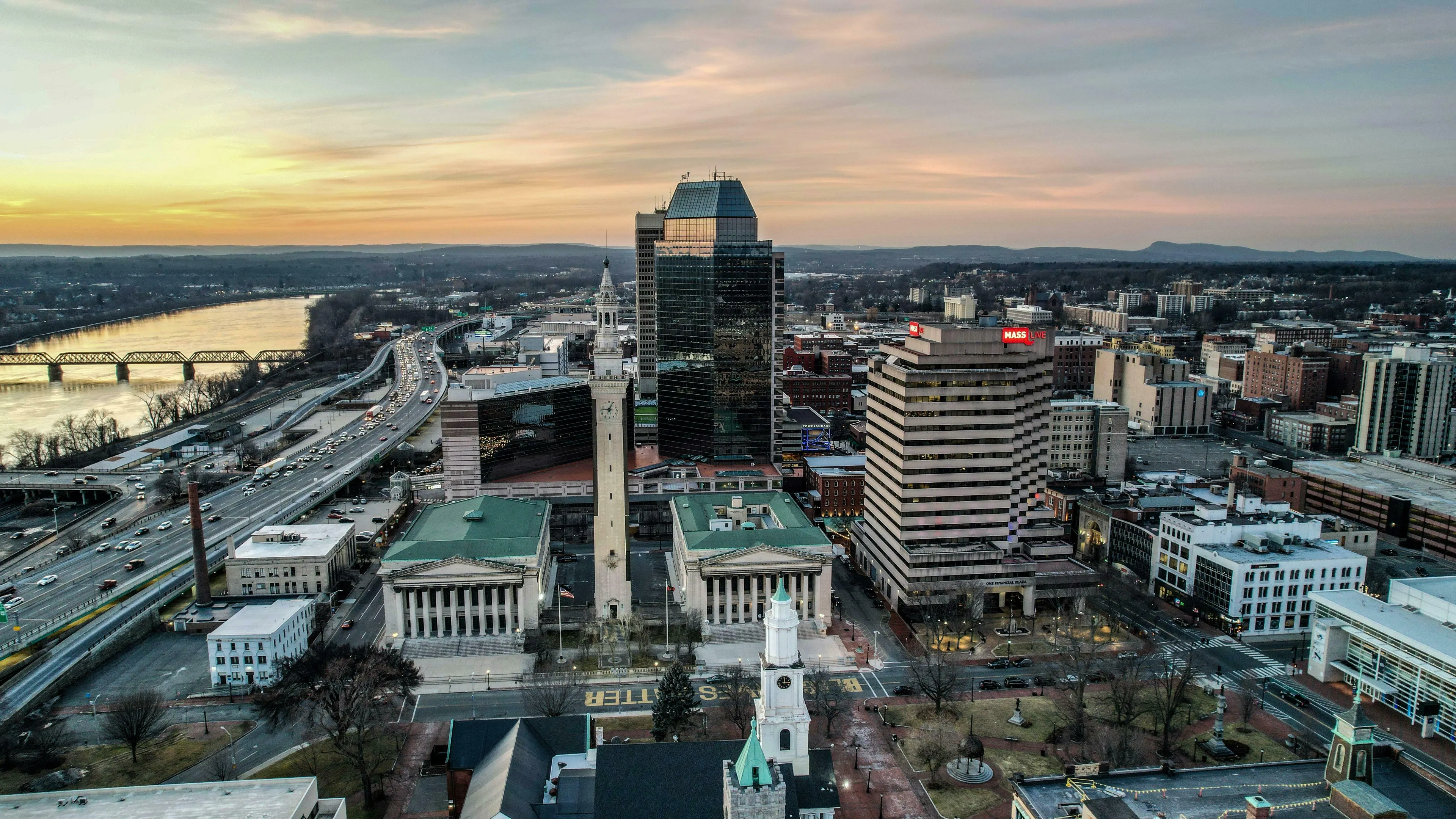 US State Capitals Quiz: Springfield, IL, home of a US president, featuring a vibrant city skyline at sunset.