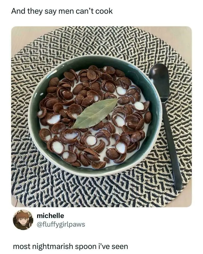 Chocolate cereal with milk topped with a bay leaf, showcasing questionable food combos served in a bowl.