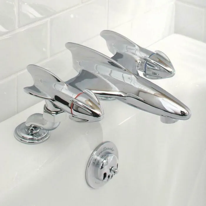 Chrome faucet designed as sleek airplane minimalism bathroom design