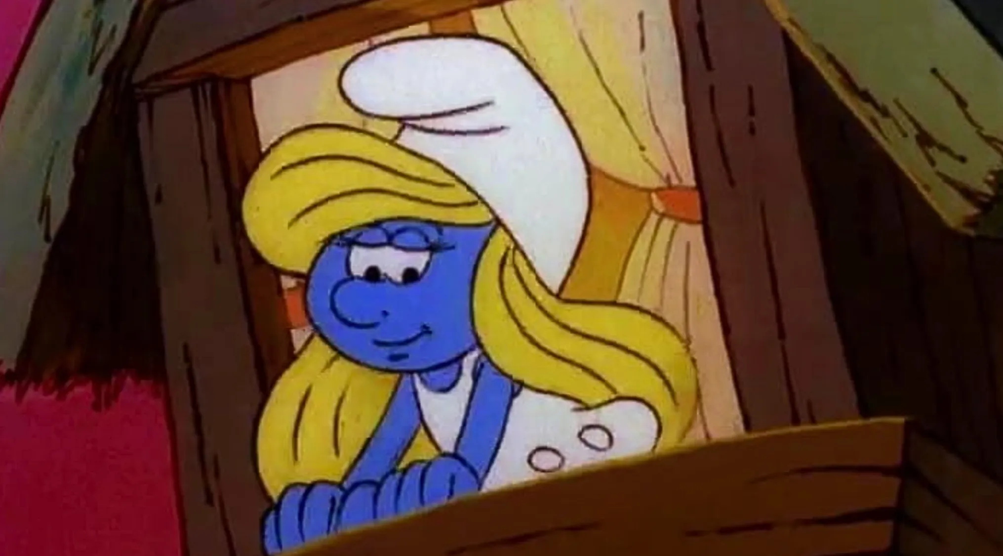 Saturday Morning Cartoons Trivia: Smurfette, the blonde Smurf, looking out a window. What is this Smurf's name?