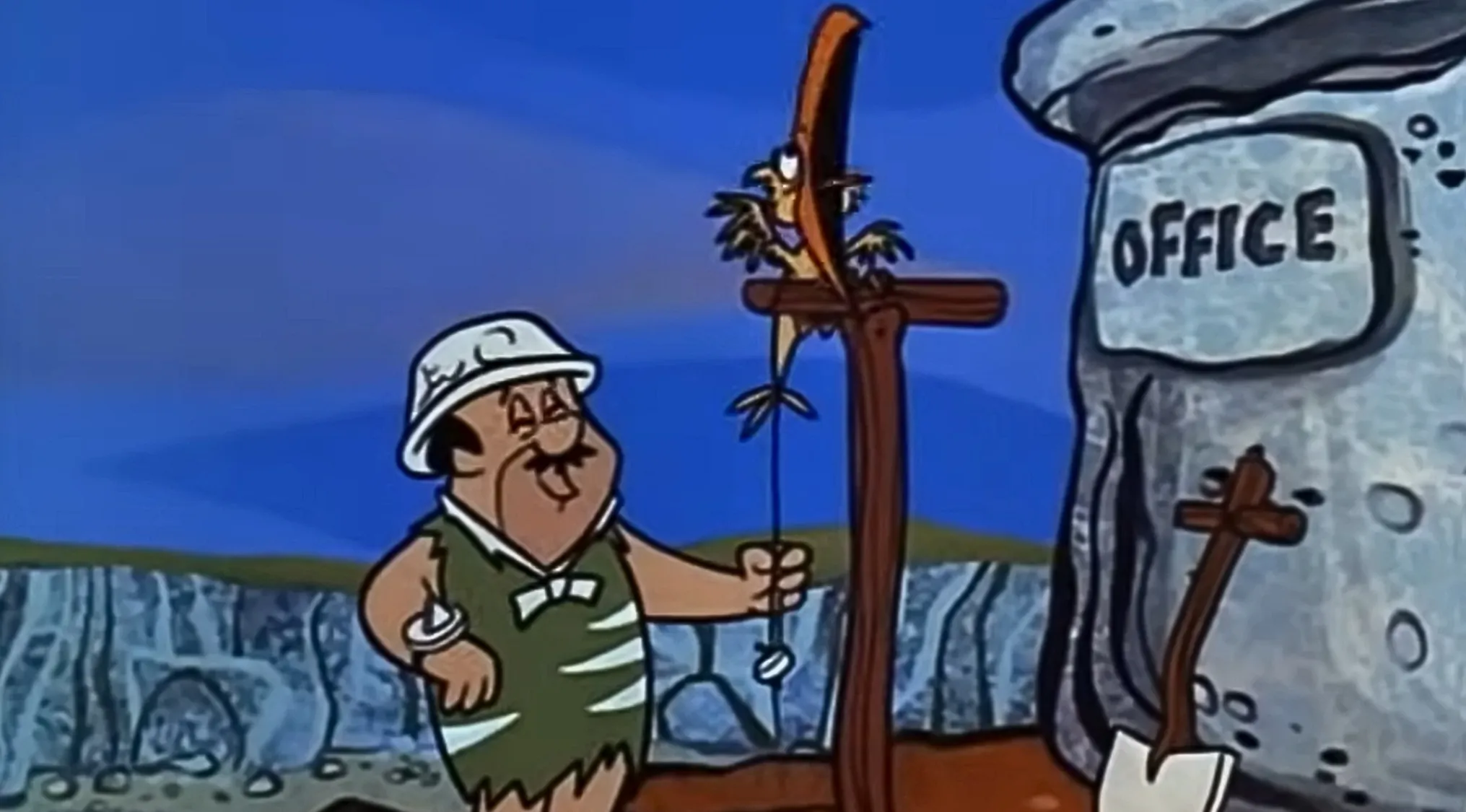 Cartoon character wearing a pith helmet, holding a string with a dinosaur, next to an "OFFICE" sign. Saturday Morning Cartoons Trivia.
