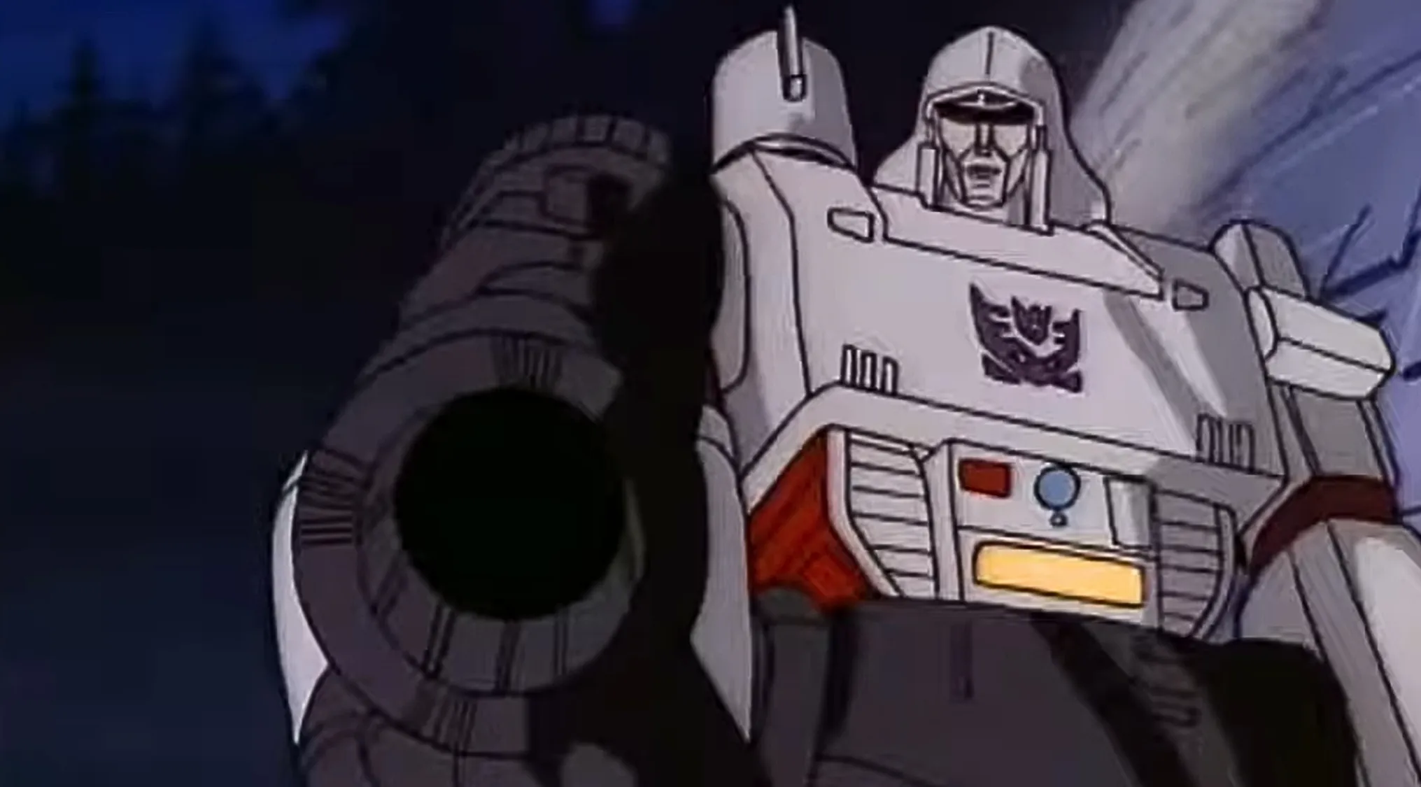 Saturday Morning Cartoons Trivia: A close-up of the Transformers character Megatron, aiming his fusion cannon.