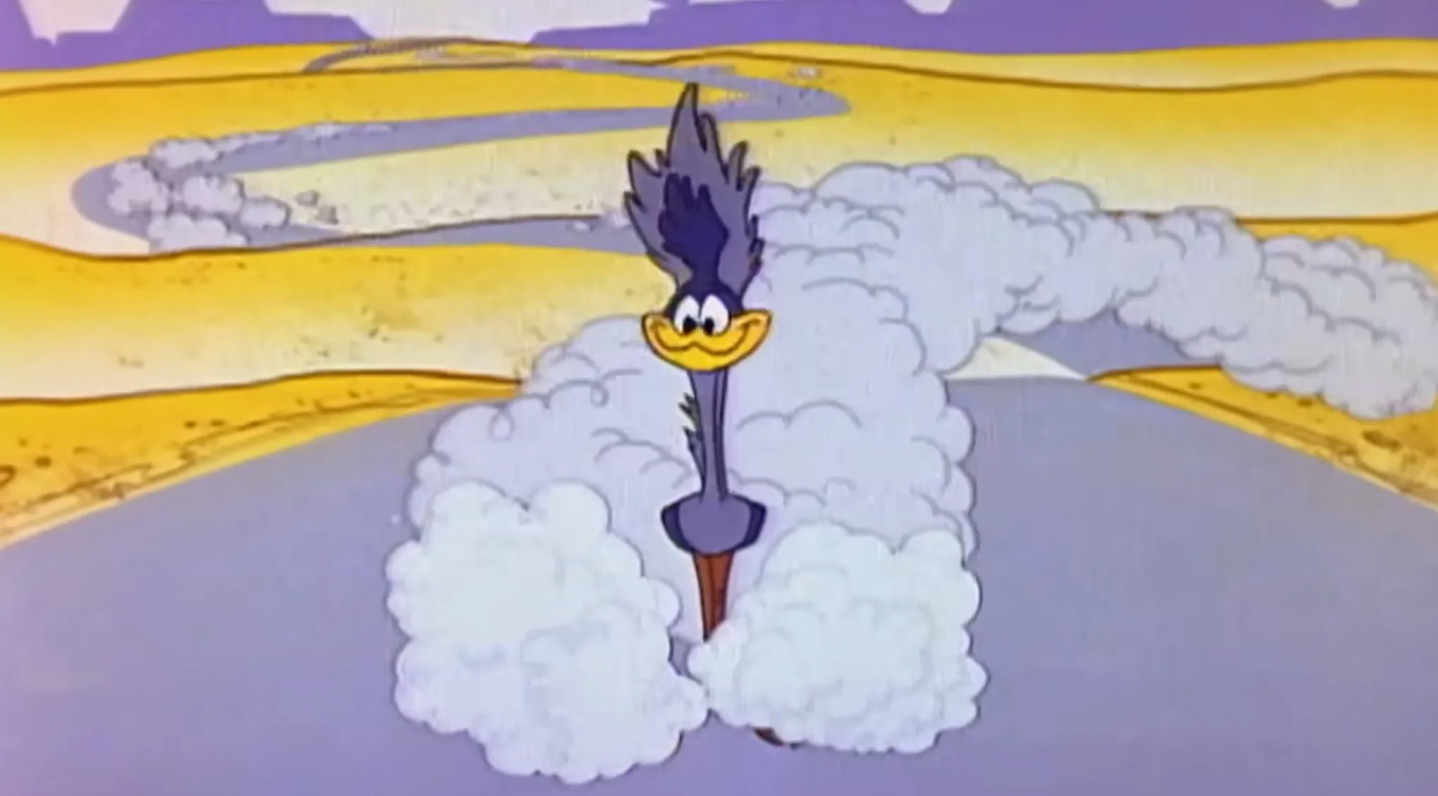 Road Runner cartoon, speeding down a desert road, leaving a cloud of dust. Saturday Morning Cartoons Trivia.