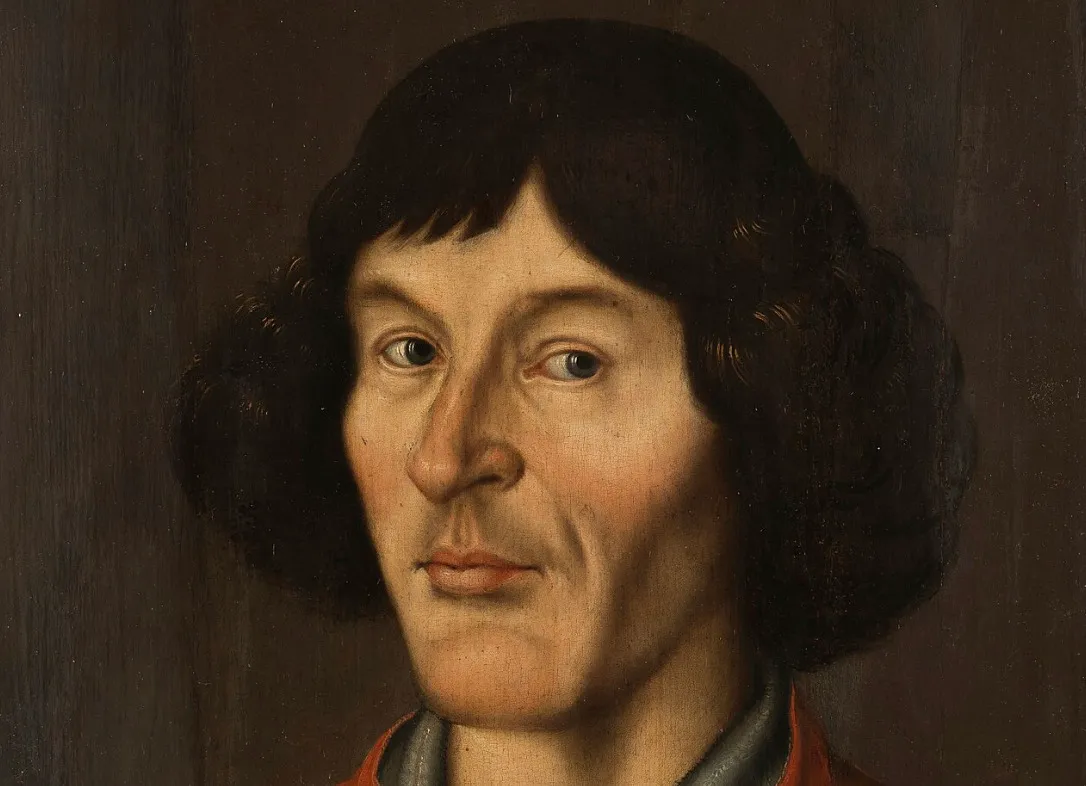 A detailed portrait painting of astronomer Nicolaus Copernicus, featuring his dark hair and a serious expression.