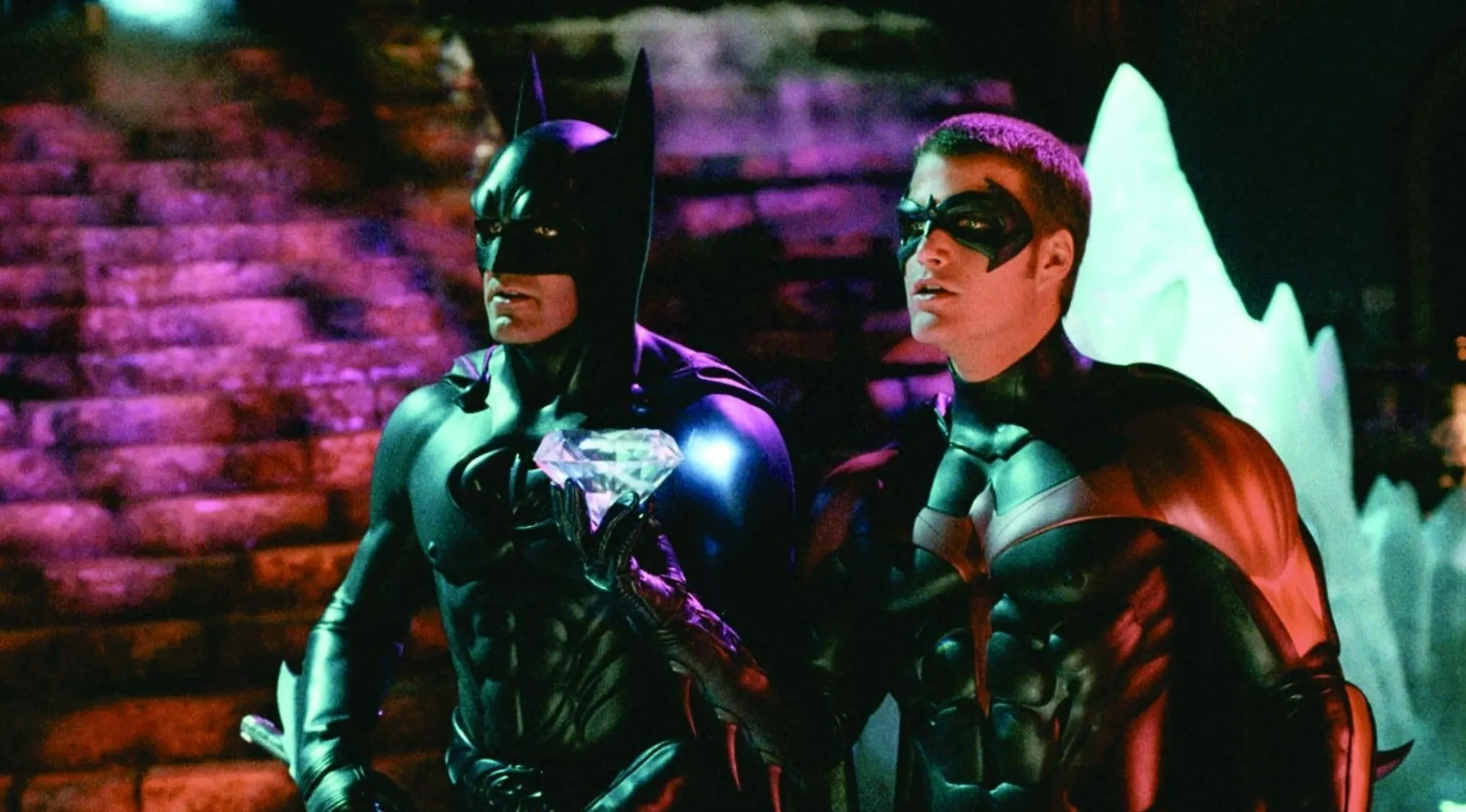 Batman holding a large diamond, standing next to Robin, the loyal companion. General Knowledge S Part 2.