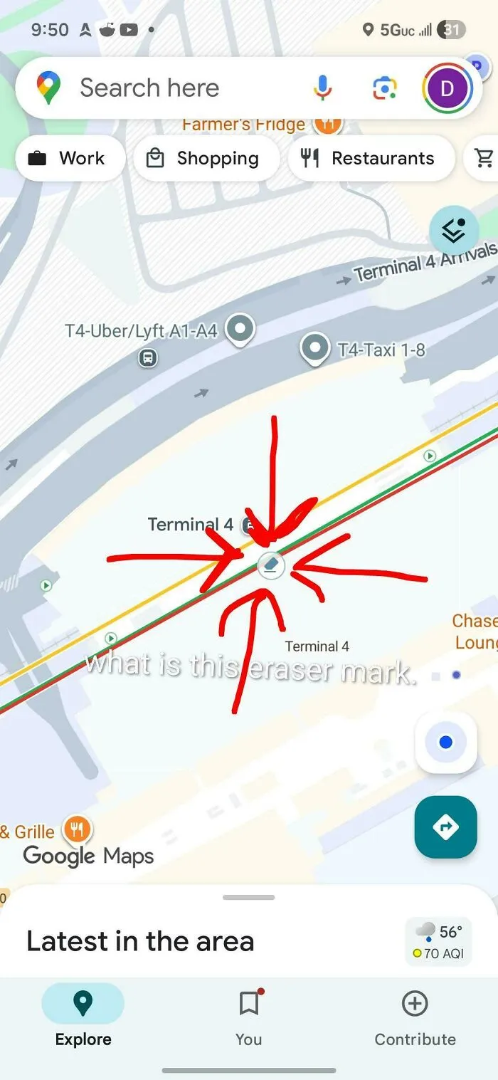 Google Maps map of Terminal 4 with red arrows pointing to an eraser mark anomaly