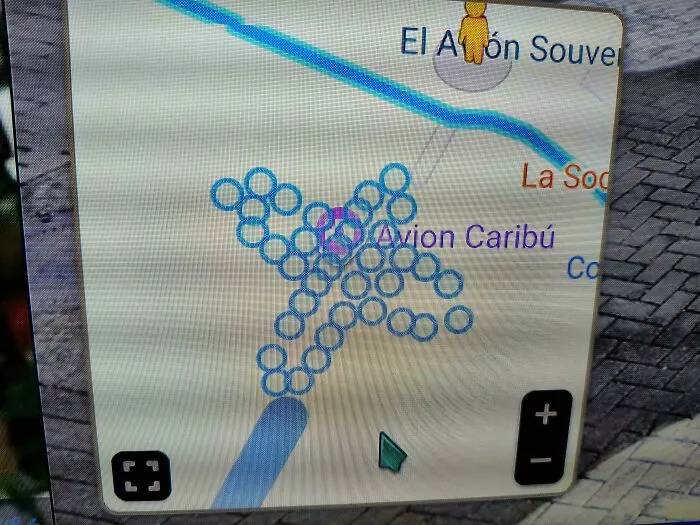 Google Maps showing a puzzling airplane shape made of blue circular icons