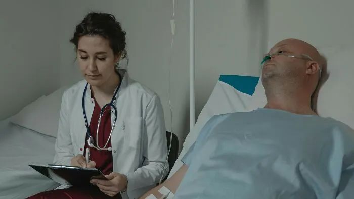 You discover that a patient has only a few months to live. The patient has explicitly told you they don’t want to know the prognosis if it’s bad because they’d rather live peacefully instead of becoming a “living pity party” for their family and “an experiment for the next newest treatment.” The patient’s family privately begs you to tell them how it is so they can look for ways to improve their relative’s comfort and stay with them for their last days. You come out of your office and find both the patient and their family waiting for the news.