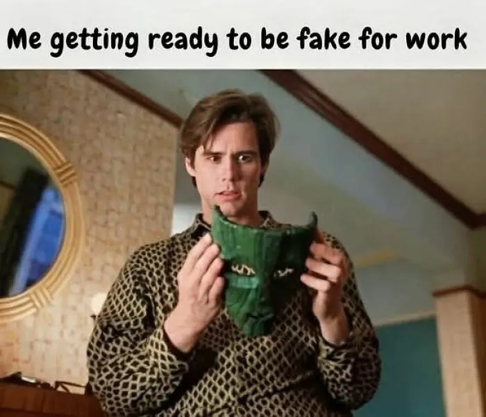 Jim Carrey holding a mask in top-tier random memes for work humor