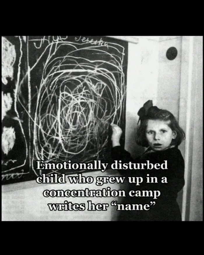Emotionally disturbed child drawing on chalkboard in concentration camp, terrifying history facts