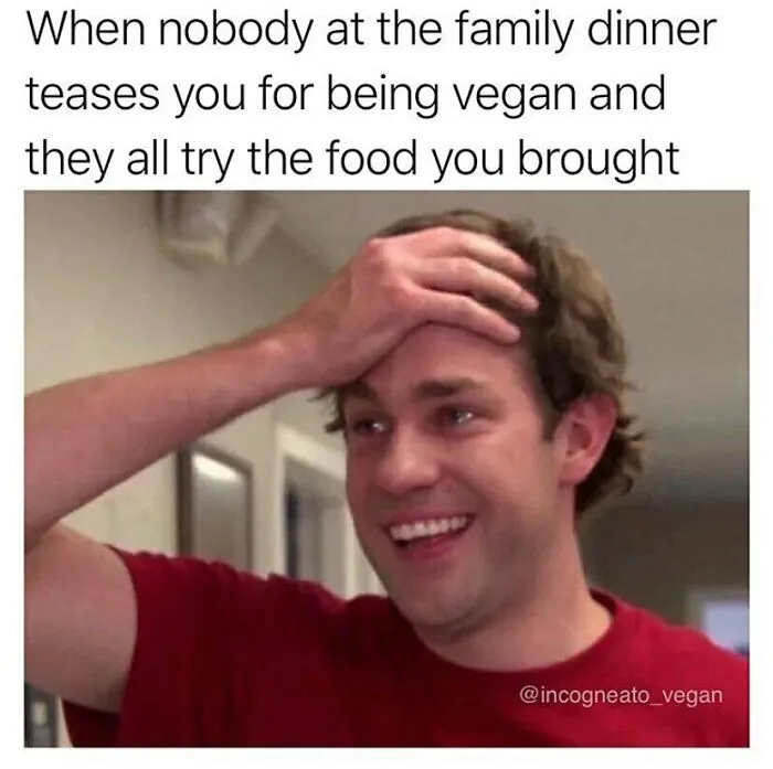A man looking happily surprised, clutching his head, with the text When nobody at the family dinner teases you for being vegan and they all try the food you brought. A funny meme for vegans.