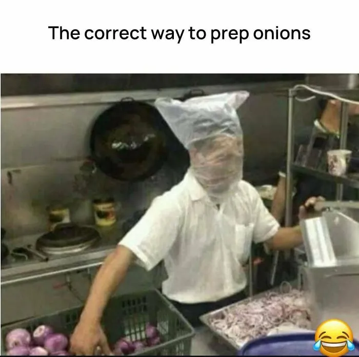 Person wearing plastic bag over head preparing onions humorously