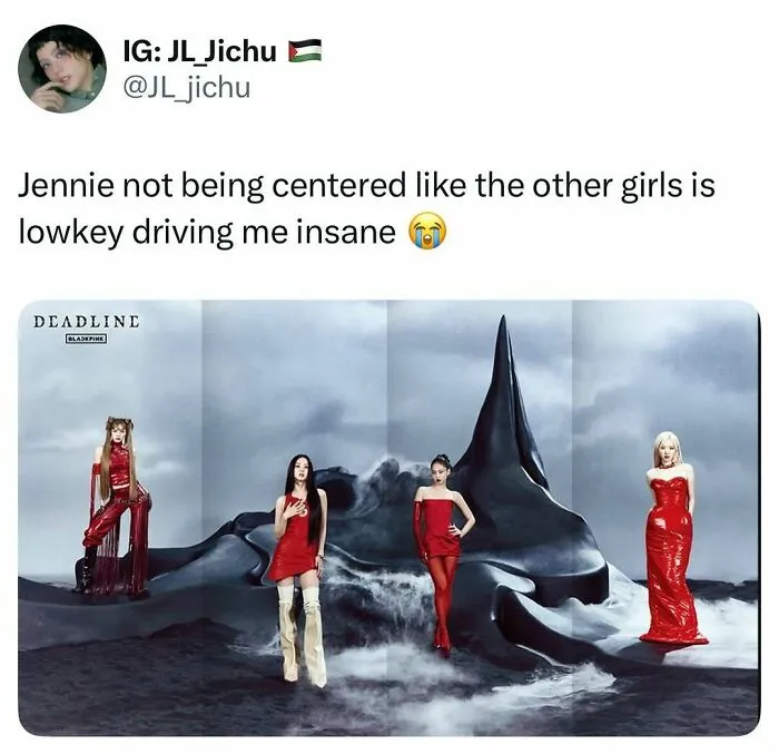BLACKPINK group photo with Jennie off-center in stylish red outfits