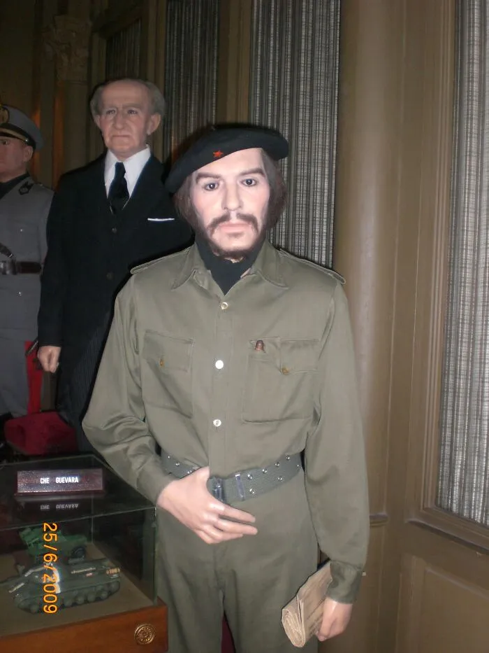 Wax figure of Che Guevara dressed in military outfit with beret in museum exhibit