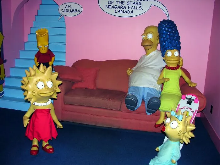 The Simpsons wax figures display in living room setting from celebrity wax figures collection