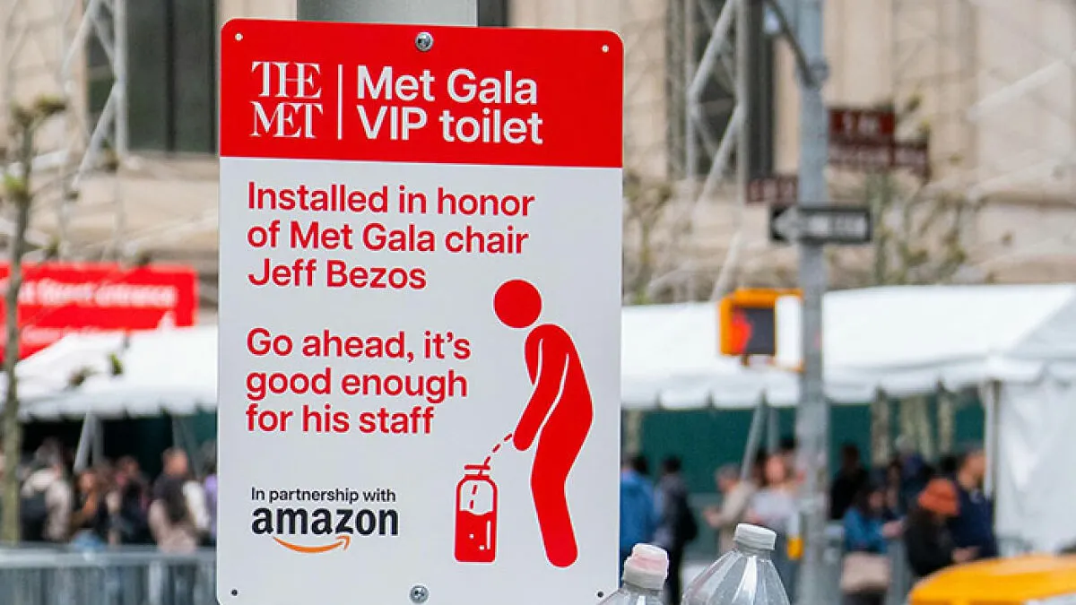 Hilarious Sign Mocking Jeff Bezos Outside Met Gala Hailed As "Iconic"
