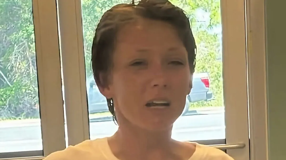 Dog Owner Fakes Heart Attack As She's Arrested After Pets Horrifically Attack Woman In Front Of Husband