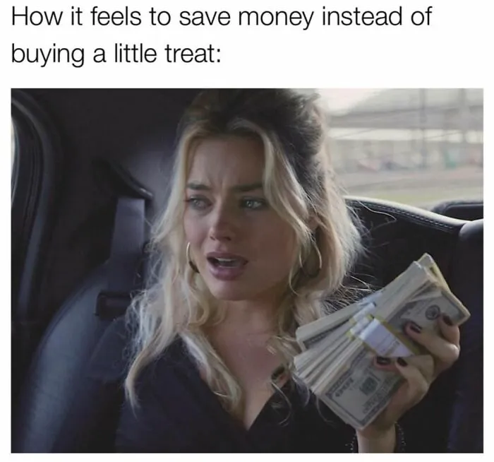 Woman holding cash showing feeling of saving money meme