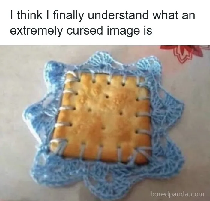 Square cracker sewn to crocheted doily illustrating cursed image meme