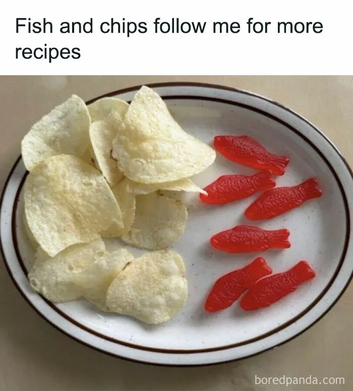 Plate with chips and red gummy fish representing fish and chips food meme