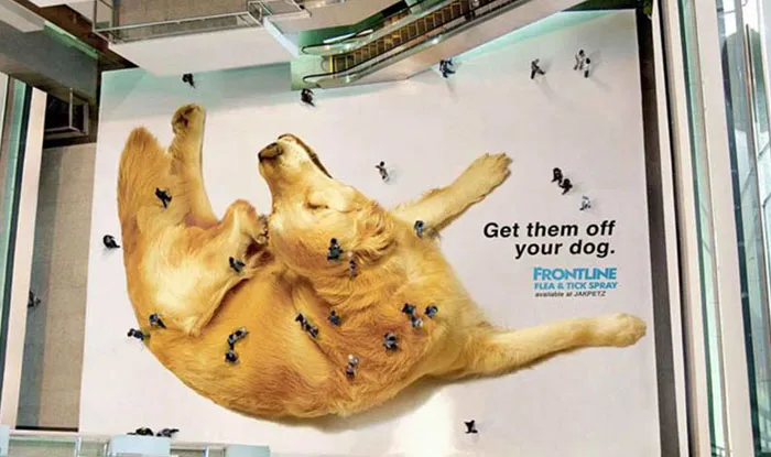 Advertising concept showing giant dog with tiny workers removing fleas for flea and tick spray