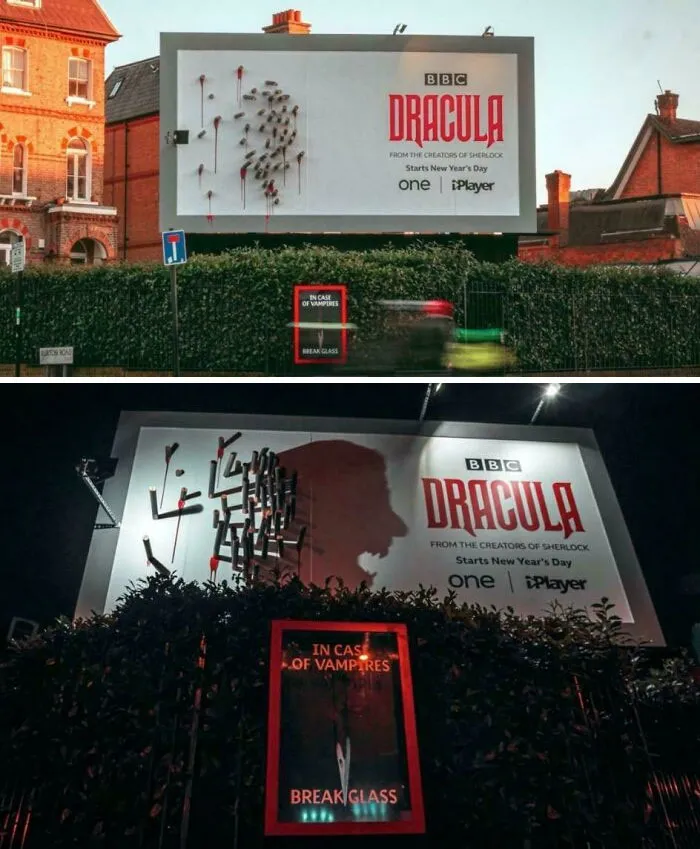 Cartel publicitario en el que aparece un retrato de Drácula por la noche gracias a las sombras de las estacas