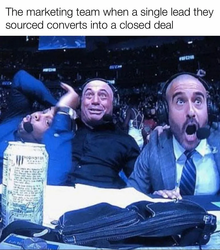 Excited marketing team reacting wildly after a single lead converts into a closed sales deal