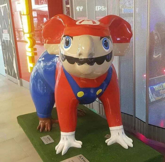 Cursed statue combining Mario and a rodent