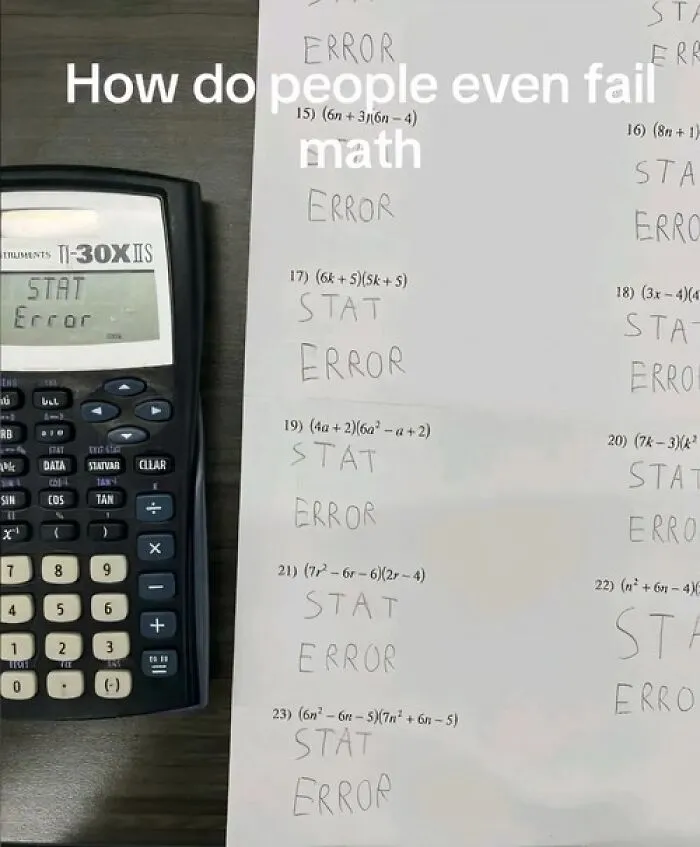 Humorous math test with calculator showing STAT error message