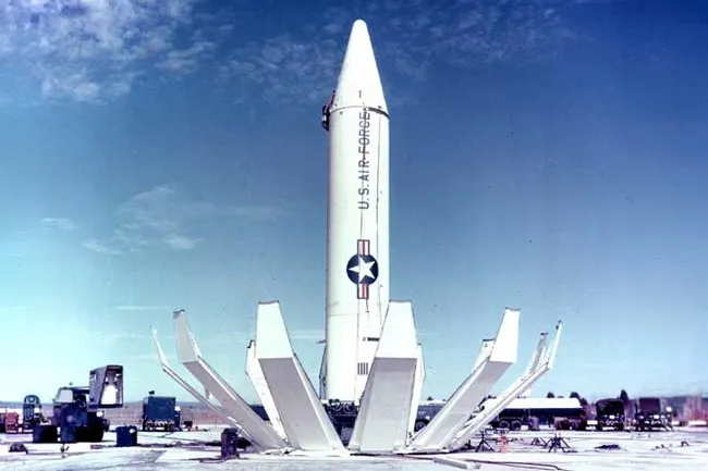 A U.S. Air Force missile standing tall on its launchpad, hinting at the escalating tensions of the Cuban Missile Crisis.