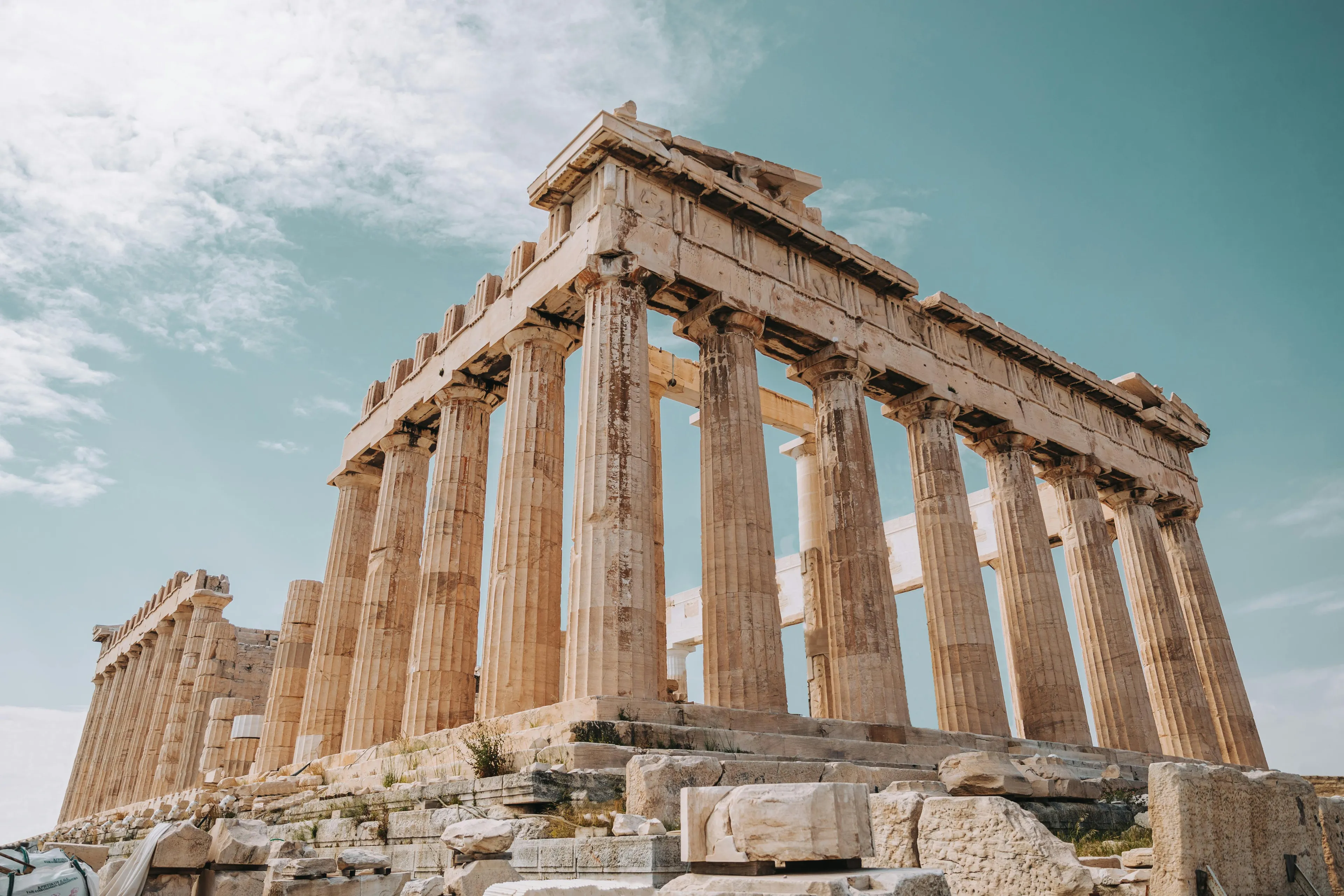 Ancient Parthenon temple in Greece, with majestic columns against a clear blue sky. A perfect holiday destination.