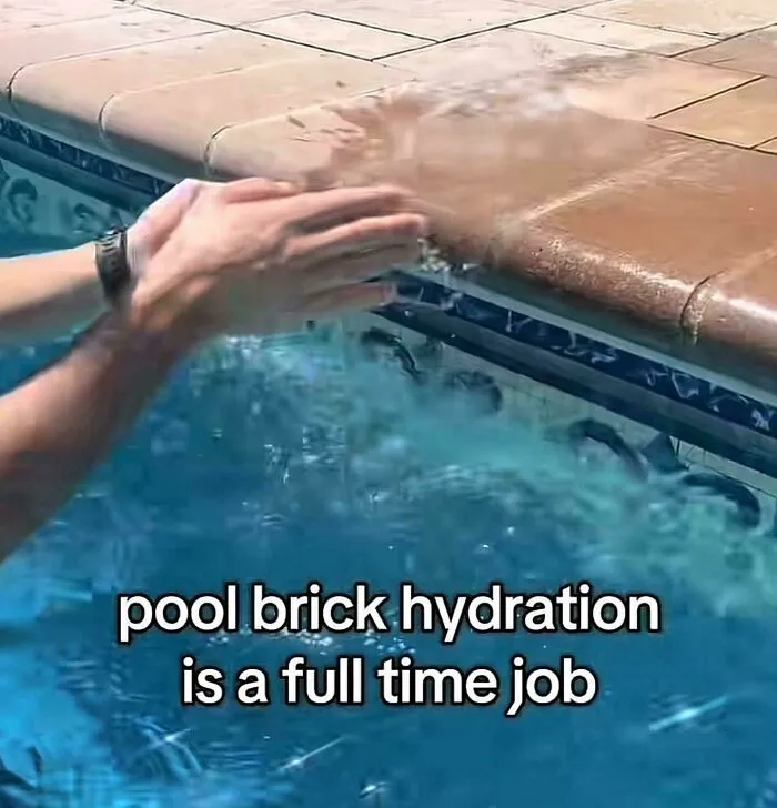 Pool brick hydration full time job hands splashing water on brick edge