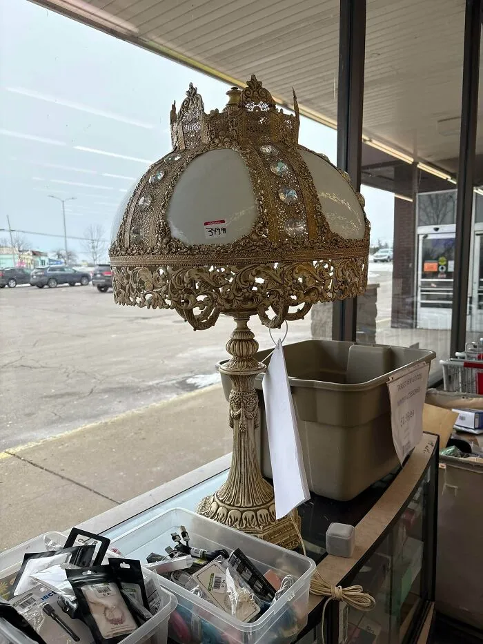 Vintage ornate table lamp with jeweled shade at thrift store priced 349.99