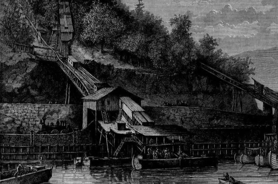 Grayscale illustration of an inclined plane on a canal, showing boats and a steam engine for transportation. Canals transformed travel.