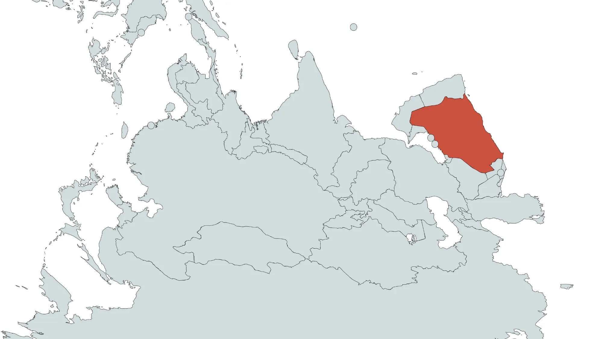 A world map with an upside-down orientation, highlighting one country in red. Guess the country from the crazy map.