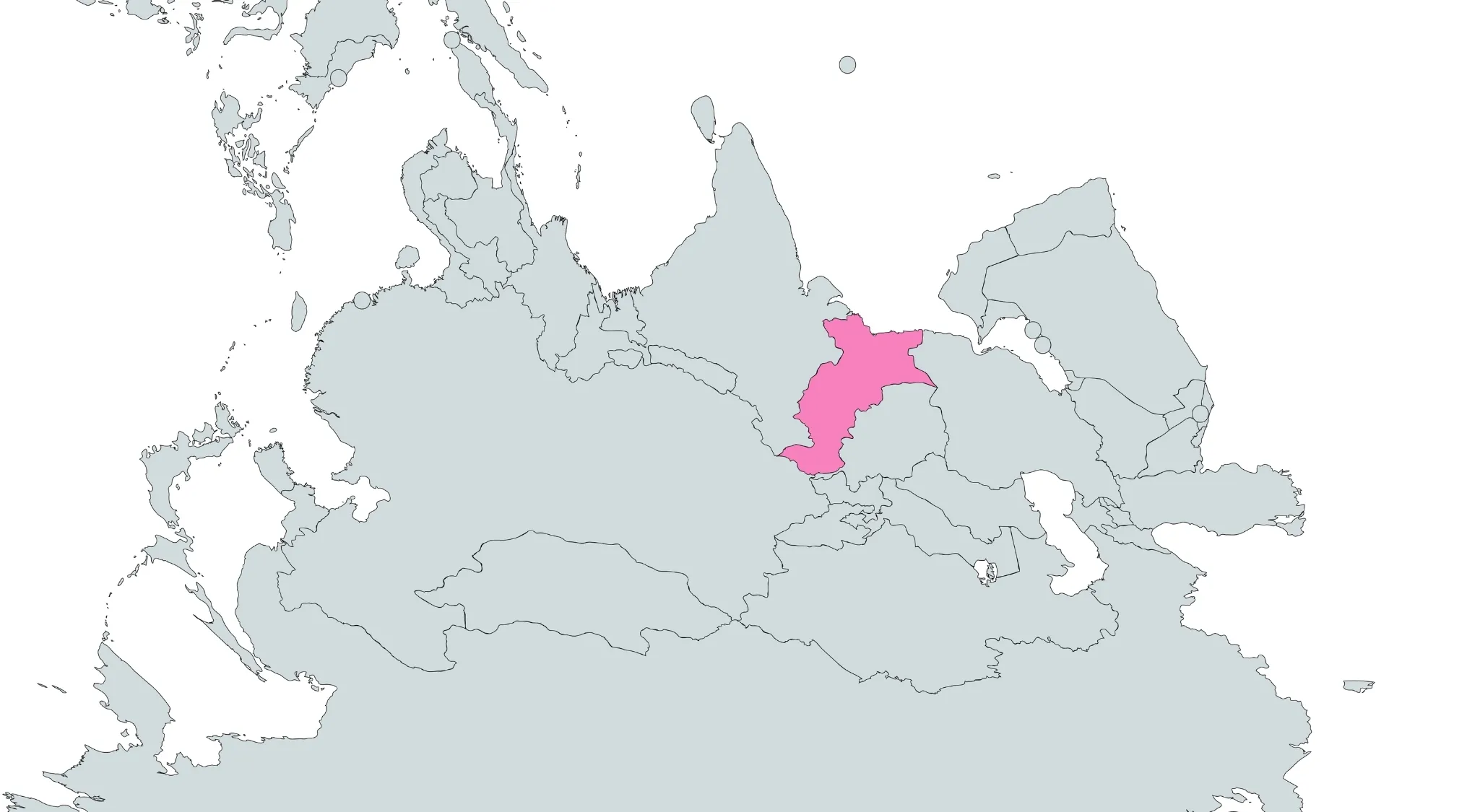 A gray world map with a country in northern Asia highlighted in pink. Geography Challenge: Guess The Country.