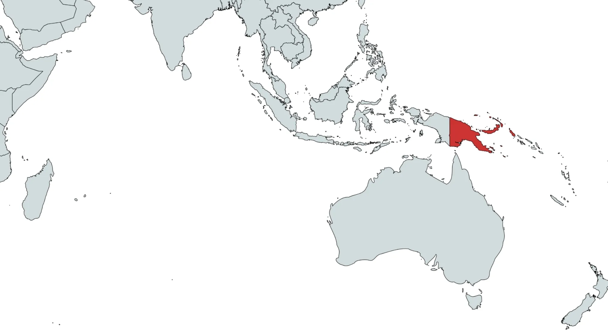 A world map showing Papua New Guinea highlighted in red. What country are we looking at? Can you guess the country on the map?